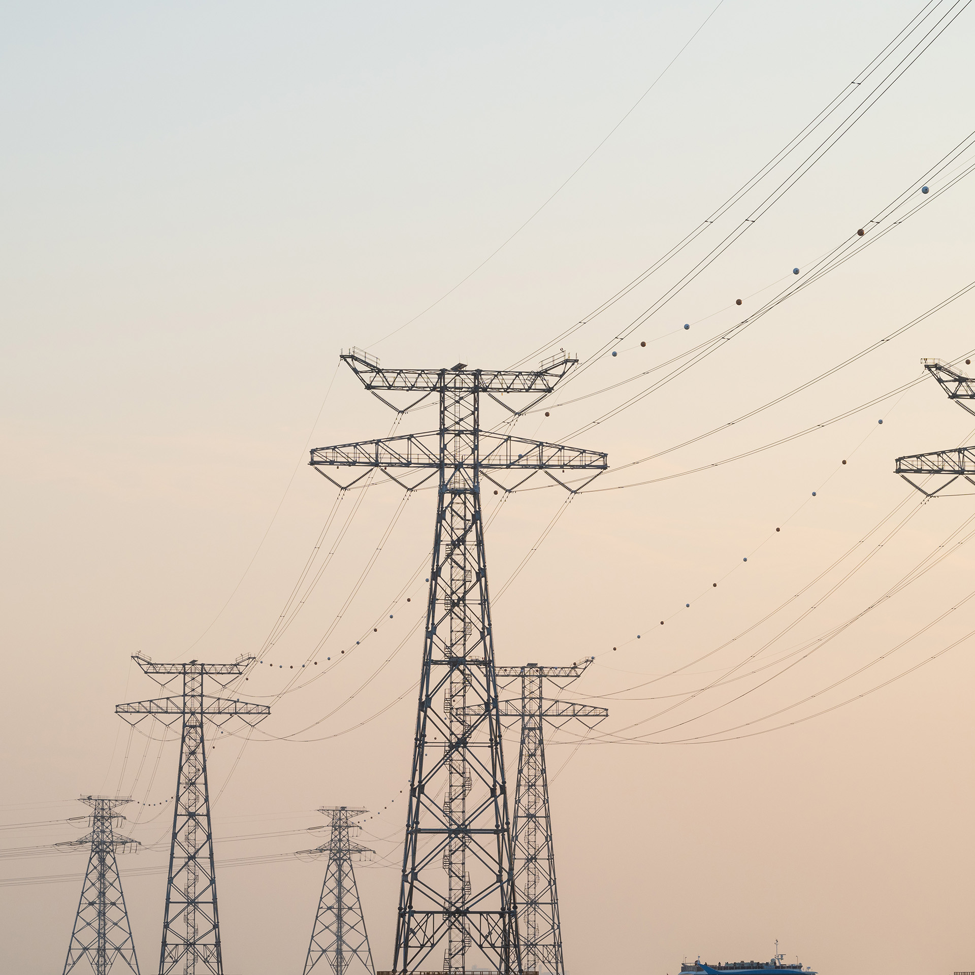 Power lines against a twilight sky