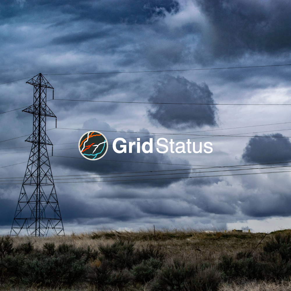 Transmission lines with a stormy sky with GridStatus logo